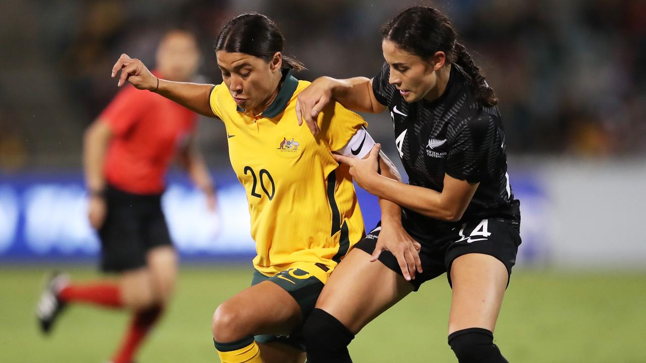 Sam Kerr of Australia is challenged by Claudia Bunge of New Zealand. (Photo by Matt King/Getty Images)