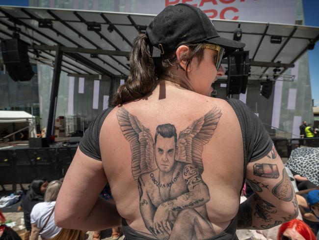 Hazel McLeod shows off a Robbie tattoo on her back. Picture: Tony Gough