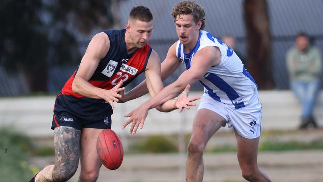 VFL: Coburg’s Adam Swierzbiolek and Jacob Edwards of North Melbourne fight for the ball. Picture: Hamish Blair