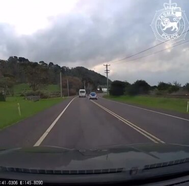 Moment car crosses lane into oncoming traffic