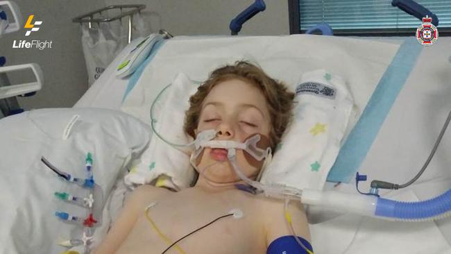 Yarren was critically unwell and in an induced coma to reduce brain swelling after a severe anaphylactic reaction to hairy caterpillars. Picture: LifeFlight.