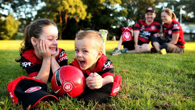 Western Sydney Wanderers fans Brett and Vicky Mathison with their four year old twins Alexia and Michael.