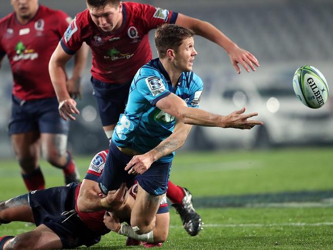 Blues outside back Matt Duffie passes the ball in the tackle. Pic: Getty