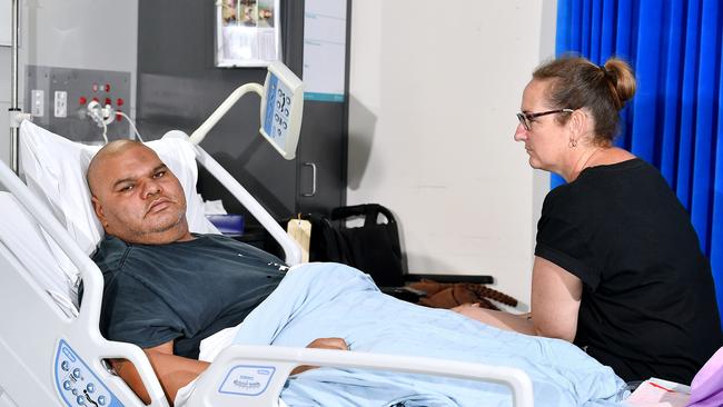 Double amputee Aaron Drahm with his partner Latecha Crimean at the Princess Alexandra Hospital. Picture: John Gass