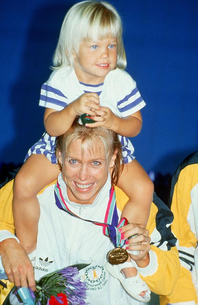 Lisa Curry with Jaimi after winning gold in the 100m butterfly in Auckland. Picture: Getty Images