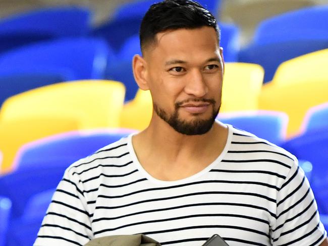 Rugby Union and former Wallabies player Israel Folau (left) is seen after the Round 14 Super Netball match between the Sunshine Coast Lightning and the Adelaide Thunderbirds at the USC Stadium on the Sunshine Coast, Saturday, August 24, 2019. (AAP Image/Dan Peled) NO ARCHIVING, EDITORIAL USE ONLY