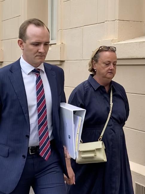 SA Pathology reporting pathologist Dr Caroline Lindsay Smith (left) leaves the coronial inquest into the death of Dennis Jackson with her lawyer, Samuel Potts. Picture: Brinley Duggan