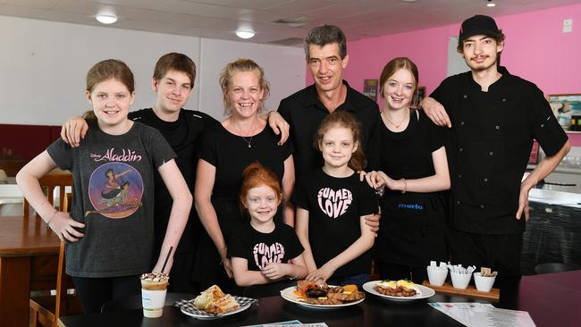 Family run Sticks &amp; Grinds Cafe, Jackie Hall and Jamie Wall with 6 of their 9 children, Rachael, 11, Riley, 15, Jaymie, 5, Ruby, 10, Mikayla, 16 and Ethan, 19, at their Deeragun cafe. Picture: Shae Beplate.