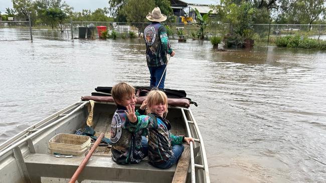 Tirranna residents make the most of the floodwaters despite being cut off by road. Picture: Jil Wilson.