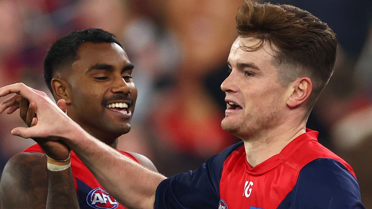 Kysaiah Pickett (left) and Bayley Fritsch were the heroes with five goals between them as Melbourne claimed an eight-point win over Geelong at the MCG. Picture: Quinn Rooney / Getty Images