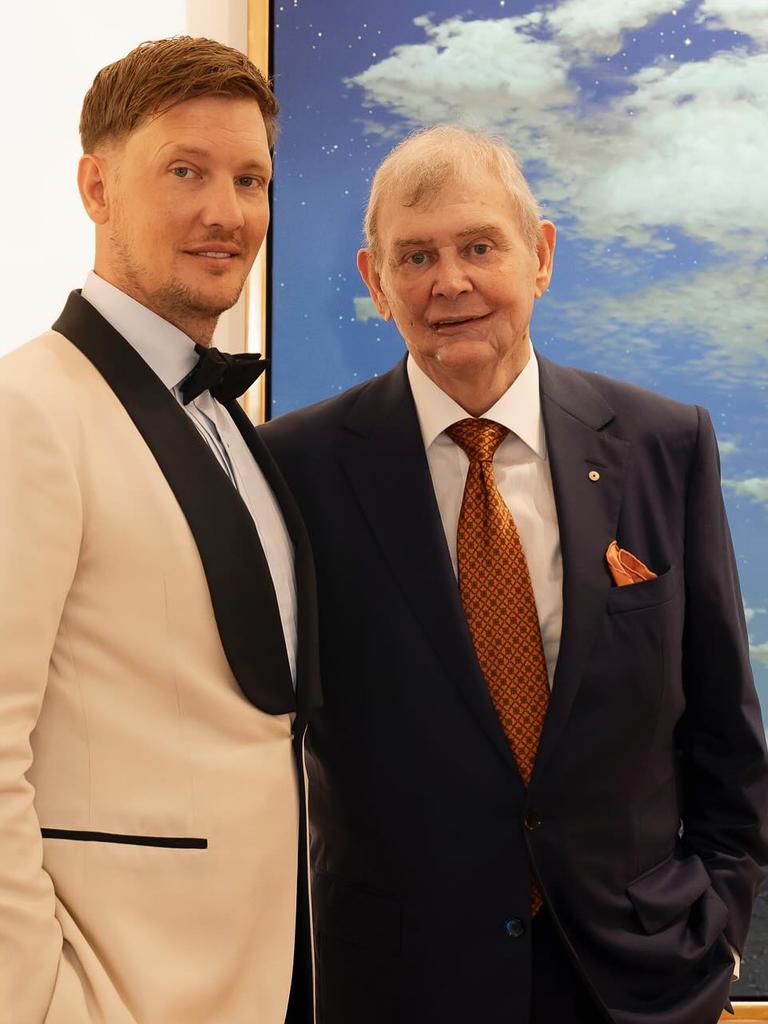 Farnham with his son Rob on his wedding day in June.