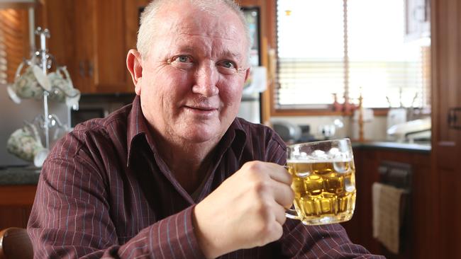 Peter Walsh can now pour and hold his own beer thanks to his hand transplant.