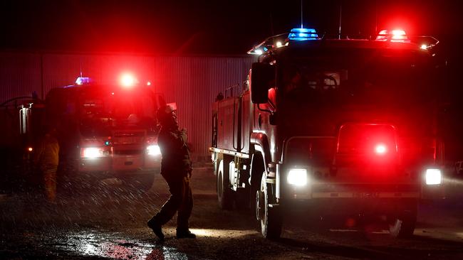 Hard at work … Rural Fire Service firefighters at Mount Adrah. Pictures: Getty Images