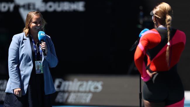 Jelena Dokic and Serena Williams meet in the middle of Rod Laver Arena. Picture: Getty Images