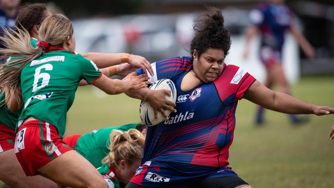 Collegian prop Adi Kelera Turaganivolo breaks a tackle. News Local, Pictures by Julian Andrews.