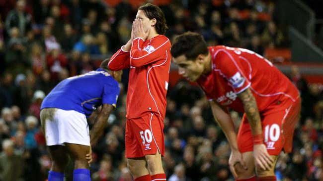 LIVERPOOL, ENGLAND - JANUARY 01: A dejected Lazar Markovic of Liverpool reacts following his team's 2-2 draw during the Barclays Premier League match between Liverpool and Leicester City at Anfield on January 1, 2015 in Liverpool, England. (Photo by Clive Brunskill/Getty Images)