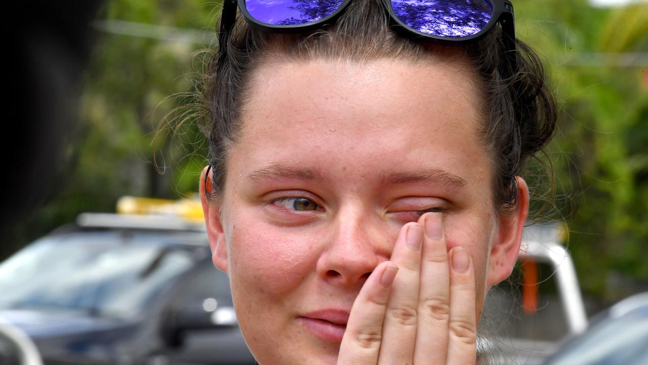 Faith Lynn is overcome with emotion at the crash scene. Picture: John Gass