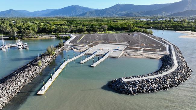 The Department of Transport and Main Roads is putting the finishing touches to the newly constructed Yorkeys Knob boat ramp facility, adjacent to Half Moon Bay Marina. The new boat ramp features six lanes, floating pontoons and dozens of car and trailer parks, surrounded by a newly constructed breakwall. Picture: Brendan Radke