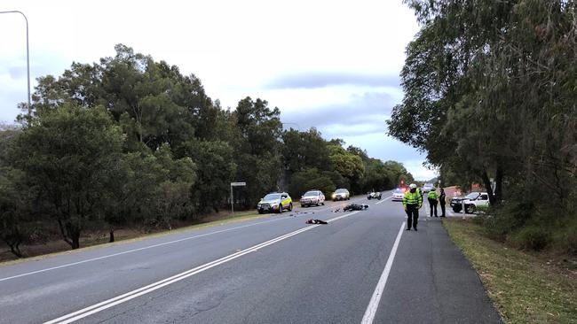 A motorcyclist has collided with a car collision on the Old Pacific Highway at Pimpama today.