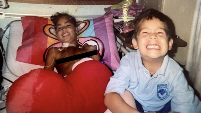 Kennedy Cherrington, aged eight, recovers after her open heart surgery, pictured here with brother Winniata Cherrington.