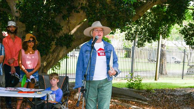 Lismore identity Julia Melvin of the Relocate Me push for flood victims speaks at a community protest outside the Daley St office of the Northern Rivers Reconstruction Corporation. Picture: Cath Piltz