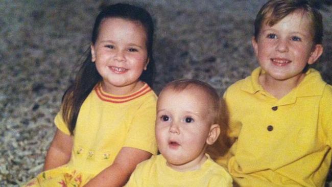 Madeleine Kelly with her two brothers Thomas (right) and Stuart.