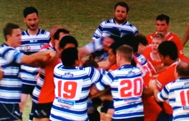 CAUGHT ON CAMERA: Players from Colts and Brothers A-grade teams throw punches as a big brawl unfolds after their game on Anzac Day. PHOTO COURTESY: CHANNEL 7 ROCKHAMPTON