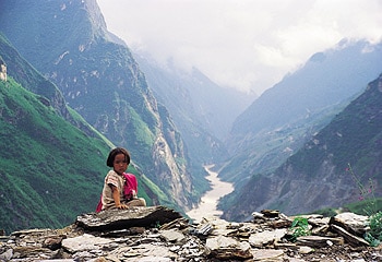 The "High Road" ... the gorge is 20km long and a path that runs along it is shared by trekkers and the region's resident Naxi people.