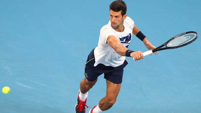 Serbia’s Novak Djokovic practices at Brisbane’s Pat Rafter Arena ahead of his opening match of the ATP Cup on Saturday. Picture: Getty Images