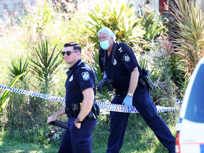 Police canvassing the area. Picture: Nigel Hallett