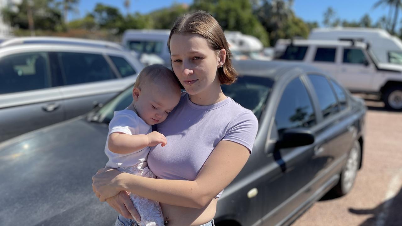 21 year old mother India Sparks with her 15 month old daughter Violet and LPG run car which is stuck at Townsville's Sealink terminal because there's nowhere to refuel it.