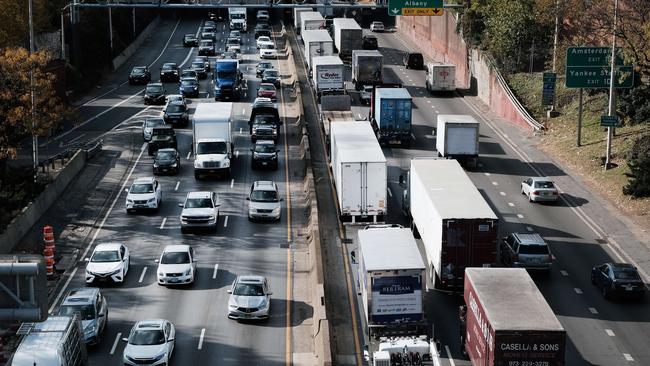 Trucks amid the cars on the Cross Bronx Expressway, in New York City. Funds allocated from the Biden administration's infrastructure legislation will be used to study capping, or putting a deck over, a stretch of the highway as a way to decrease pollution that has been linked to high rates of asthma in the Bronx borough. Picture: Getty Images / AFP