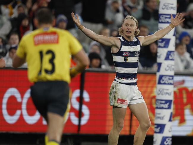 MELBOURNE, AUSTRALIAÃ&#137; June 29, 2024. AFL Round 16. Geelong vs Essendon at the MCG. Oliver Dempsey of the Cats appeals to the umpire after Jye Menzie of the Bombers walks the ball over the goal line during the 3rd qtr. . Pic: Michael Klein