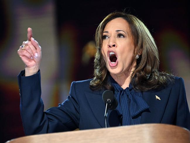 TOPSHOT - US Vice President and 2024 Democratic presidential candidate Kamala Harris speaks on the fourth and last day of the Democratic National Convention (DNC) at the United Center in Chicago, Illinois, on August 22, 2024. (Photo by ANDREW CABALLERO-REYNOLDS / AFP)