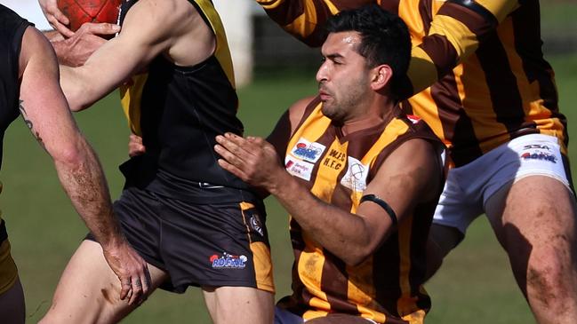 Woodend-Hesket’s Kyle Baker lays a tackle. Picture: Hamish Blair