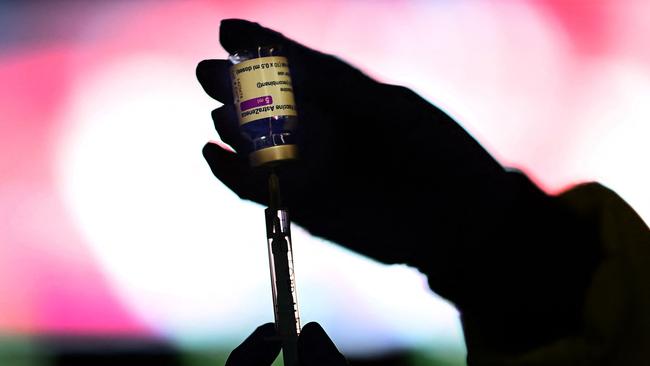 A health worker prepares a dose of the AstraZeneca/Oxford vaccine at a coronavirus vaccination centre in Madrid. Picture: AFP.