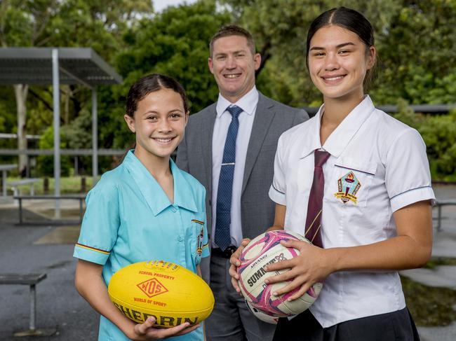 Keebra Park principal Adam Brandis with students, Okalani Compton, 11, and Sunny Gerrard, 16. Picture: Jerad Williams