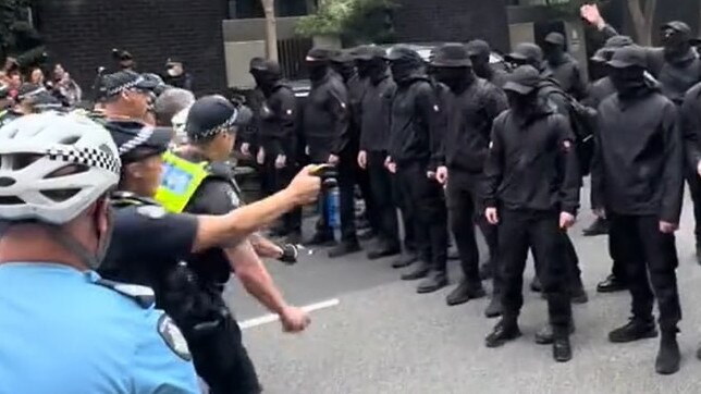 Police confront a group of suspected neo-Nazi at a pro-refugee rally. Picture: TikTok/permanentvisaforrefugees