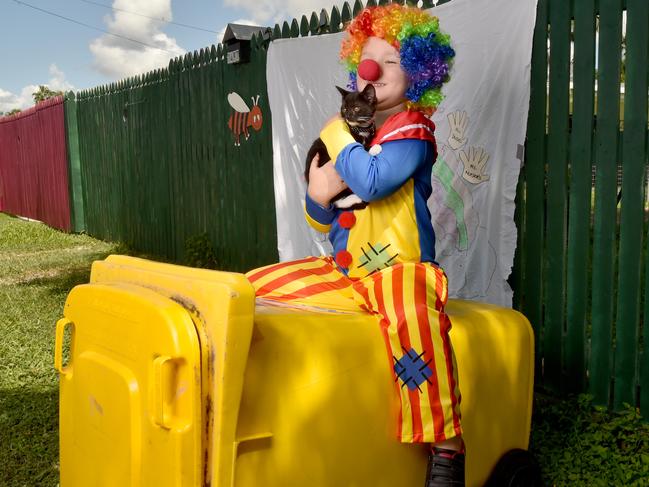 Troy Bartel, 5, with a kitten called Covid, has had his bin antics dressed as a clown posted on FB page Bin Isolation Outing. Picture: Evan Morgan