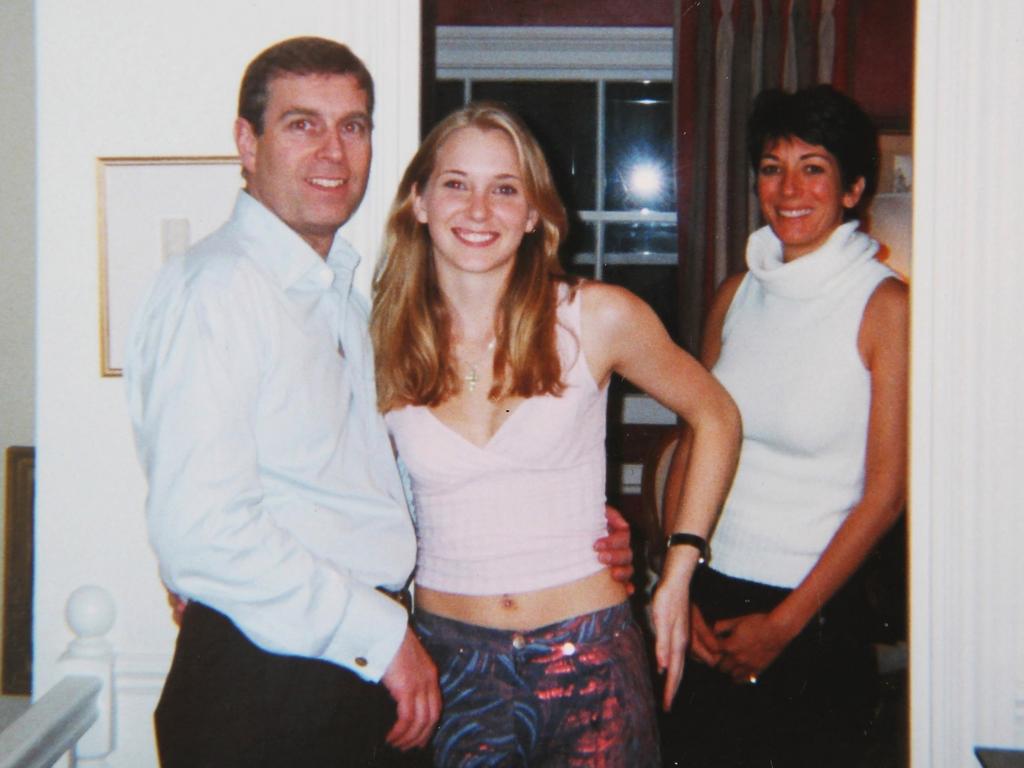 Prince Andrew poses with his arm around the waist of 17-year-old Virginia Roberts Giuffre as Jeffrey Epstein’s alleged pimp Ghislaine Maxwell looks on. Picture: BACKGRID Australia