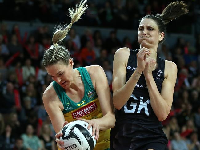 Caitlin Bassett gets the better of New Zealand’s Anna Harrison.