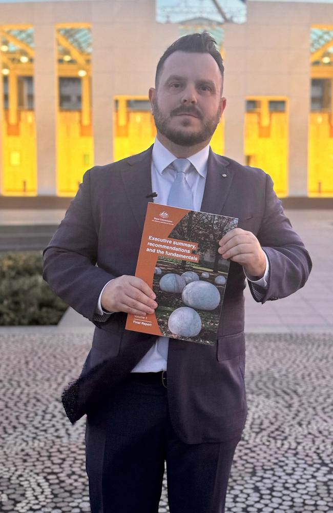 Herbert MP Phillip Thompson holds the findings of a Royal Commission Report which he pushed for since his first opportunity to speak to the parliament in 2019. He said many of the 122 recommendations reflect what was already known. Picture: Supplied. .