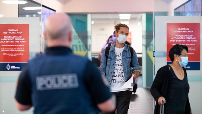 Passengers from two flights from Adelaide arriving at Darwin International Airport this morning, QF860 and JQ692, have been quarantined after the NT once again closed its borders to SA. Passengers were in the air when the decision was made, and were given the option to return to Adelaide or quarantine for two weeks in Howard Springs. Picture: Che Chorley