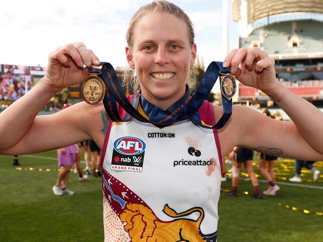 ADELAIDE, AUSTRALIA - APRIL 17: Kate Lutkins of the Lions celebrates after winning best on ground during the 2021 AFLW Grand Final match between the Adelaide Crows and the Brisbane Lions at Adelaide Oval on April 17, 2021 in Adelaide, Australia. (Photo by Michael Willson/AFL Photos via Getty Images)