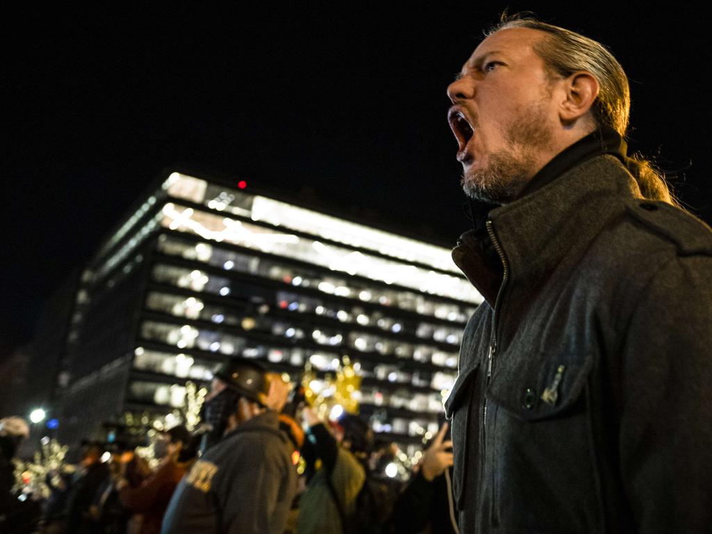 Members of Antifa and Proud Boys clash in the middle of the street following the Million MAGA March in Washington, DC. Picture: Getty Images/AFP