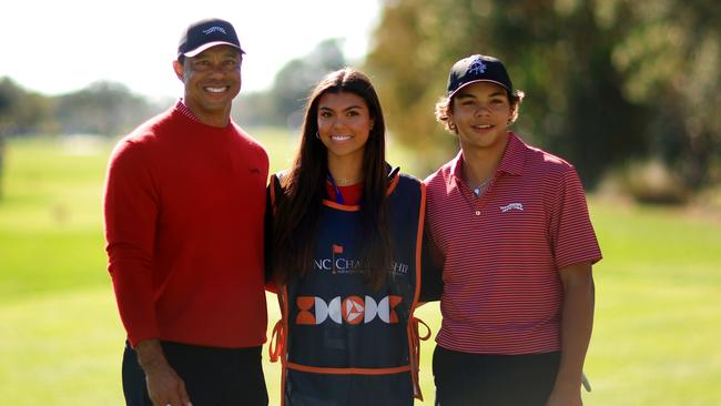 Tiger Woods with his daughter Sam and son Charlie. (Photo by Mike Ehrmann/Getty Images)