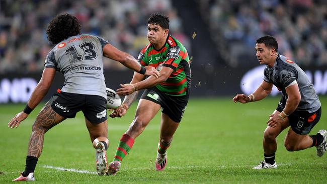 South Sydney fullback Latrell Mitchell gets a pass away against the Warriors at Bankwest Stadium on Friday evening. Picture: AAP