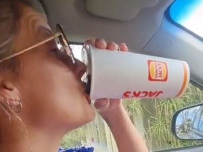 Hungry Jacks change drink lids and new hole isn’t for straws. Picture: TikTok/tishbarts