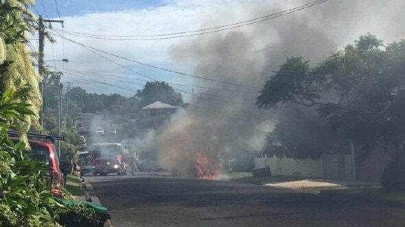 The car on fire in suburban Brisbane.