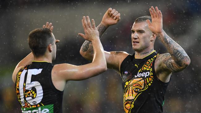 Dustin Martin and the Tigers have a date with North Melbourne at Etihad on Saturday night. Picture: AAP